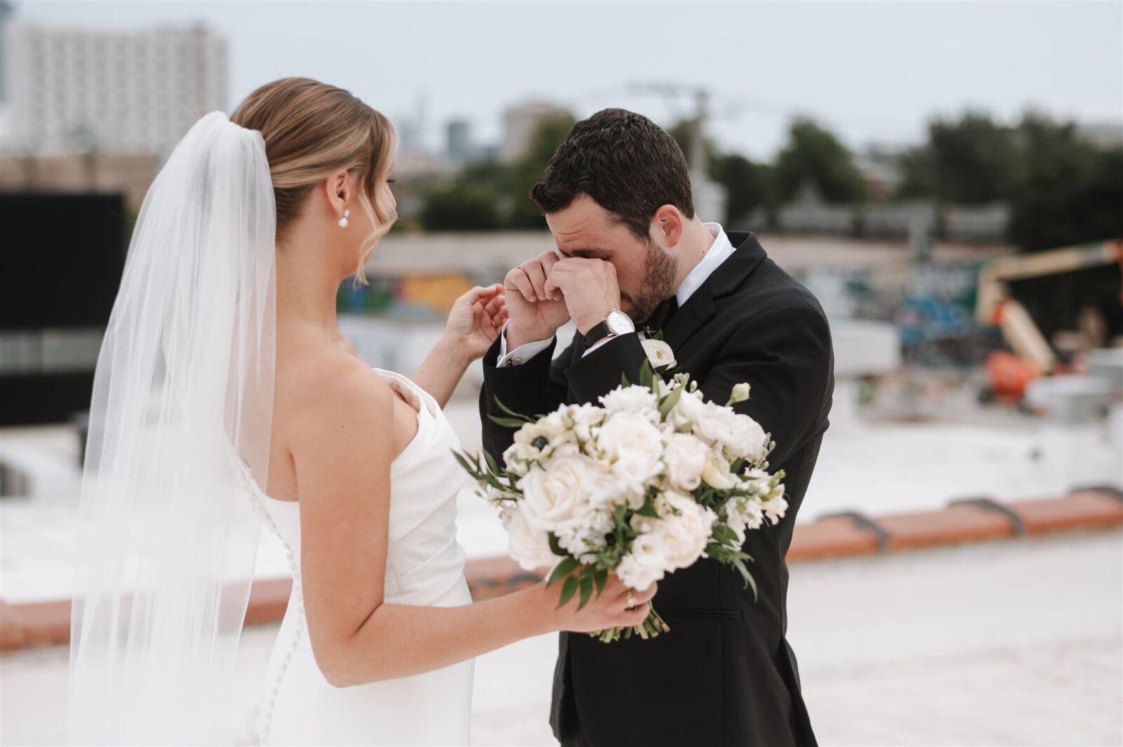 a groom's reaction seeing his bride during a first look on their wedding day