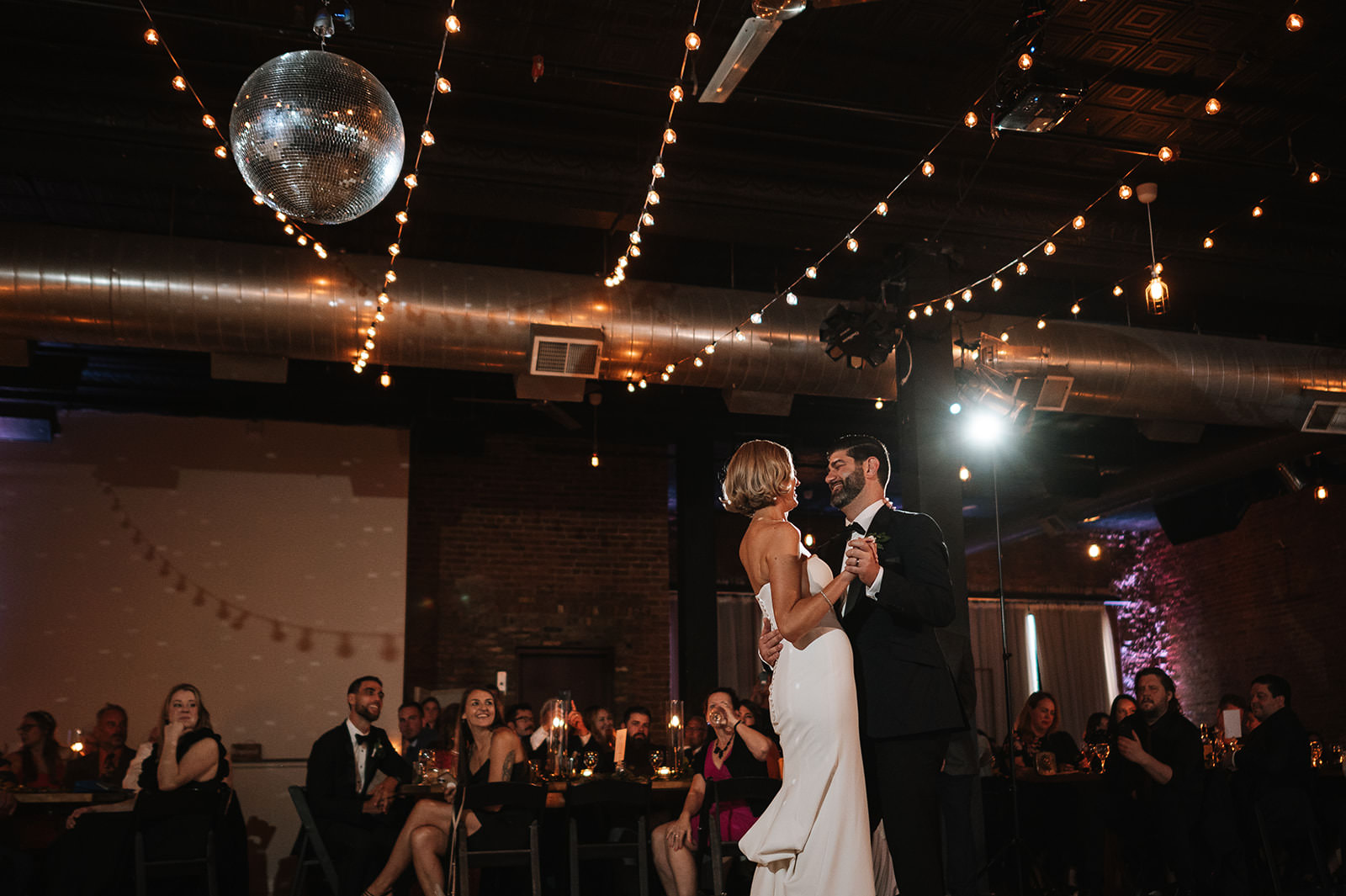 Bottom Lounge - Chicago Wedding Photography Wedding reception photography at Bottom Lounge with candid guest interaction
