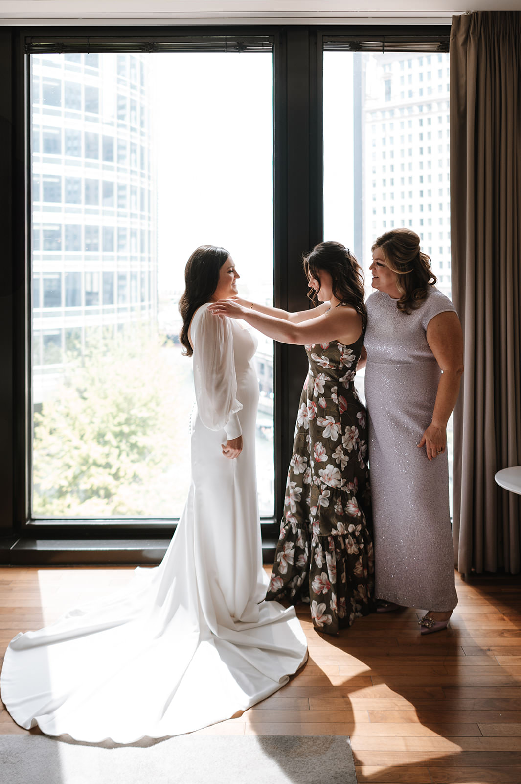 Candid wedding moment inside The Langham Chicago with soft natural light